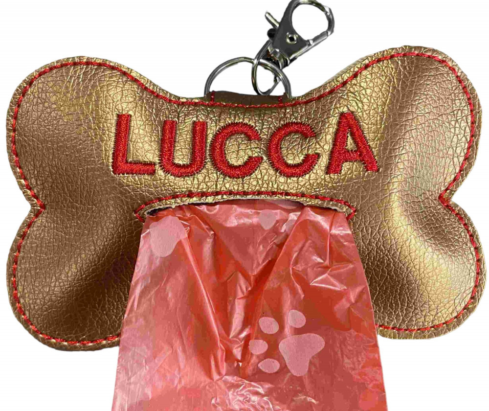 Hundeposeholder i "guld" kunstlæder