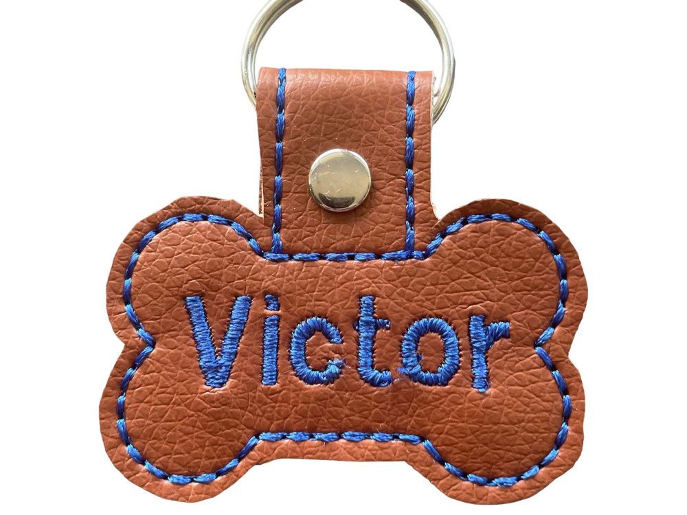 Navnetags kødben i lysbrun kunstlæder