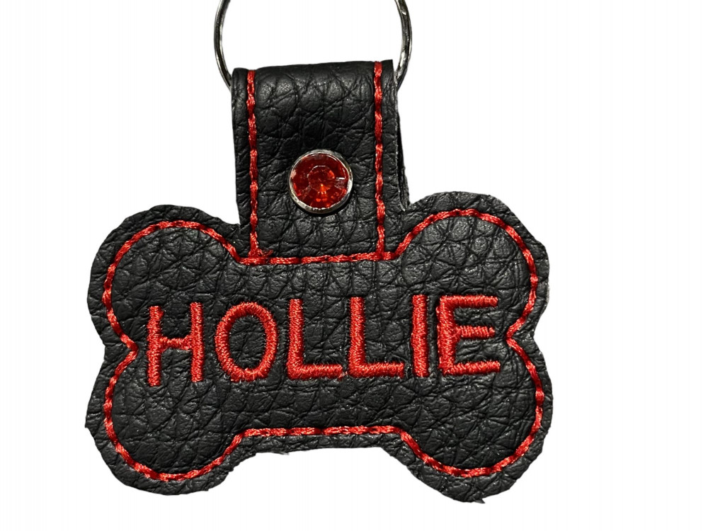 Navnetags kødben i sort kunstlæder