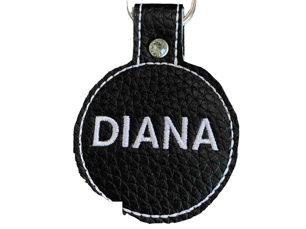 Navnetags rund i sort kunstlæder