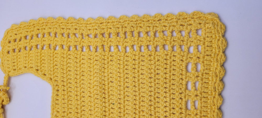 Hagesmæk med mønster, gul