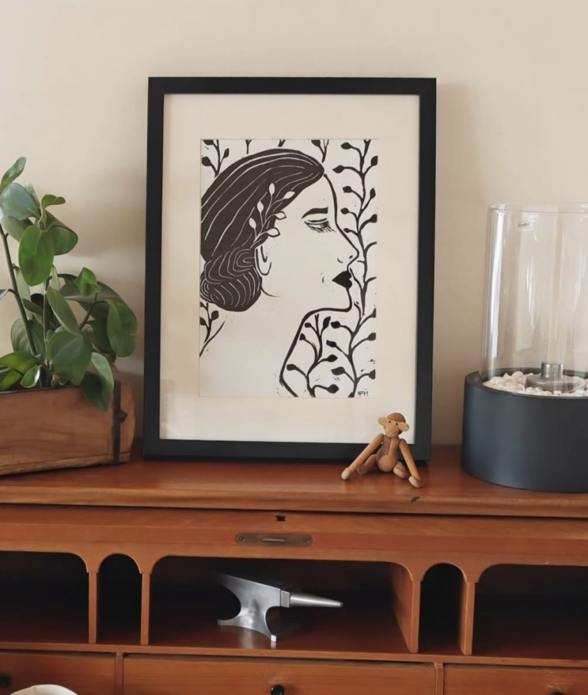 Linoleumstryk med kvindeansigt