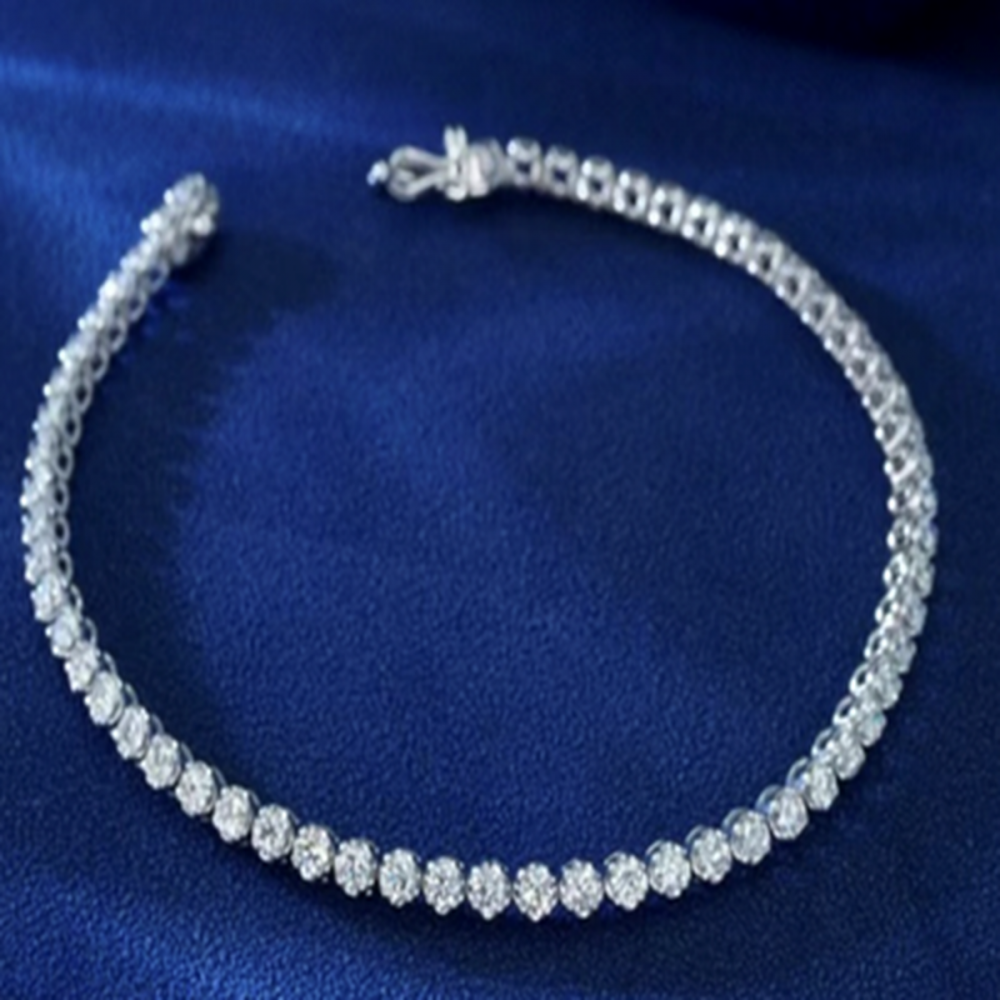 “Christine” – 18KT Tennisarmbånd, 1.24tcw